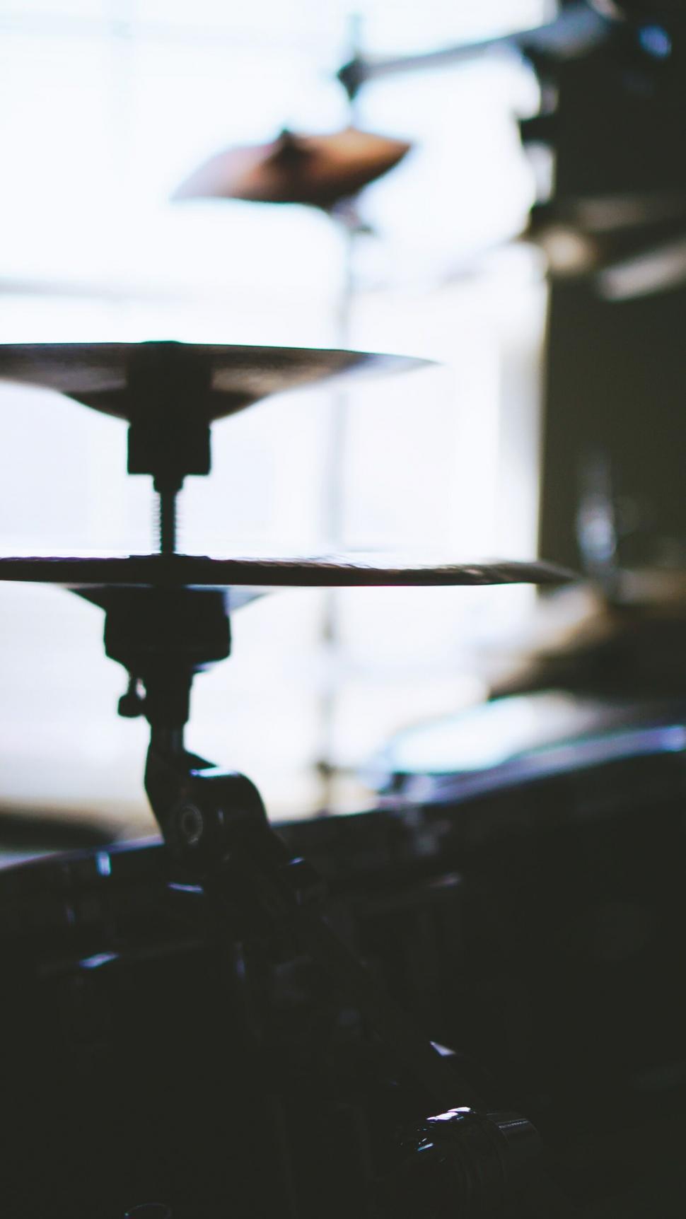 Free Image of Drum cymbal in a blurred music studio 