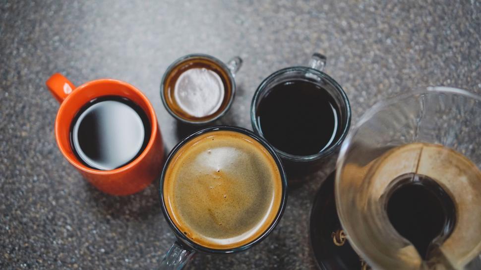 Free Image of Assorted coffee cups and brewing equipment 