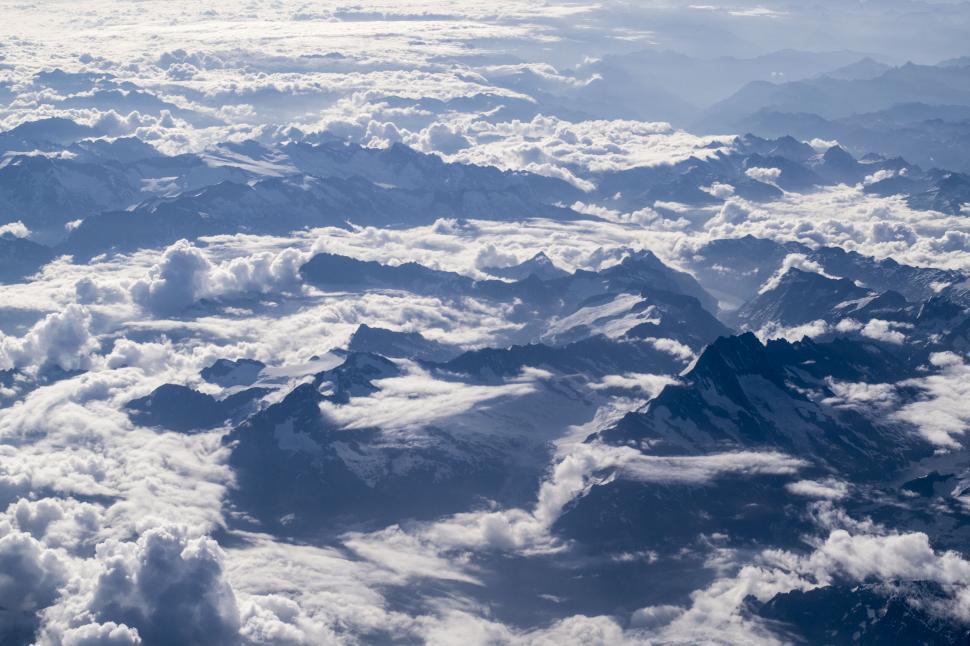 Free Image of Aerial view of snow-capped mountain peaks 