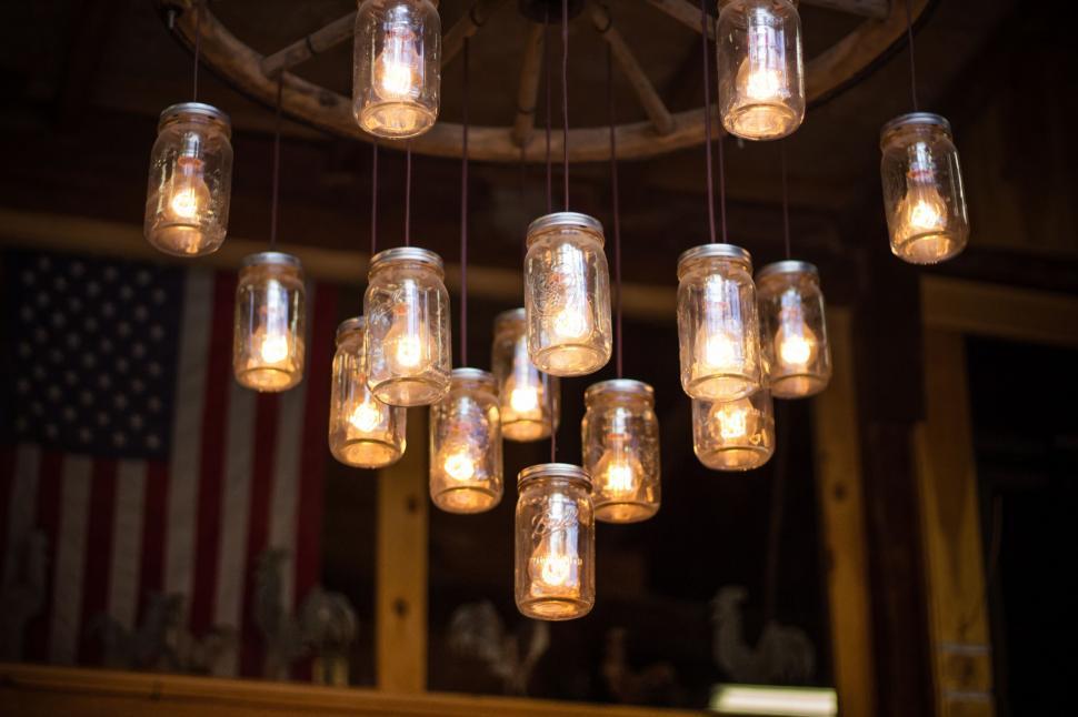 Free Image of Chandelier with mason jar lights and flag 