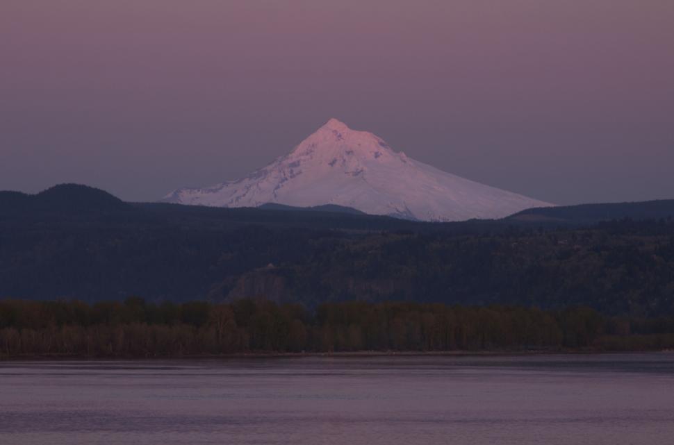 Free Image of Snow-covered mountain during twilight 
