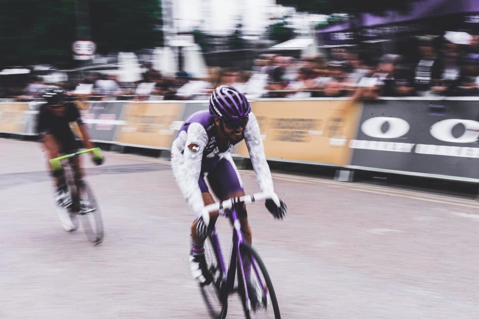 Free Image of Cyclist in high-speed motion on a race track 