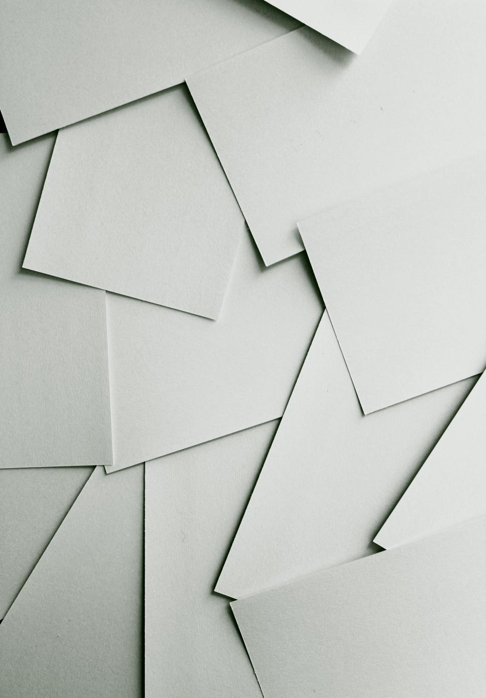 Free Image of Abstract arrangement of white paper sheets 