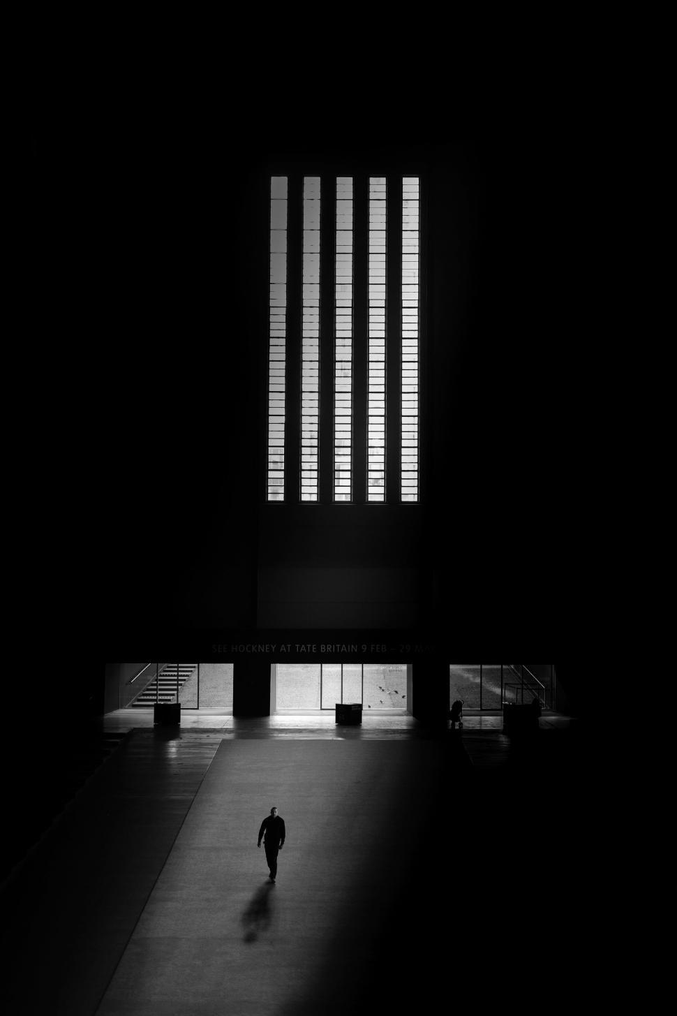 Free Image of Solitary figure walking in Tate Britain 