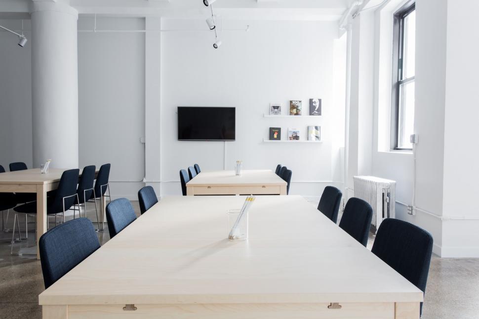 Free Image of Modern conference room with wooden table 
