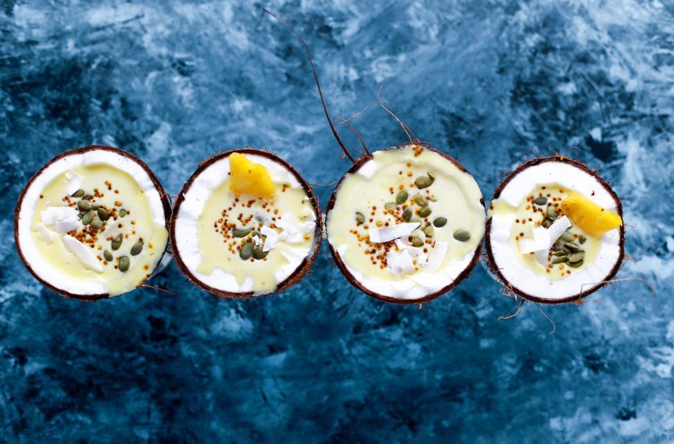 Free Image of Four coconut bowls with healthy food 