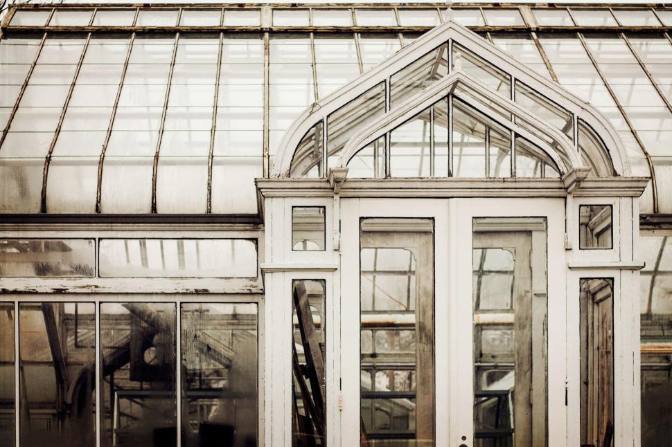 Free Image of Vintage greenhouse architecture with glass panels 