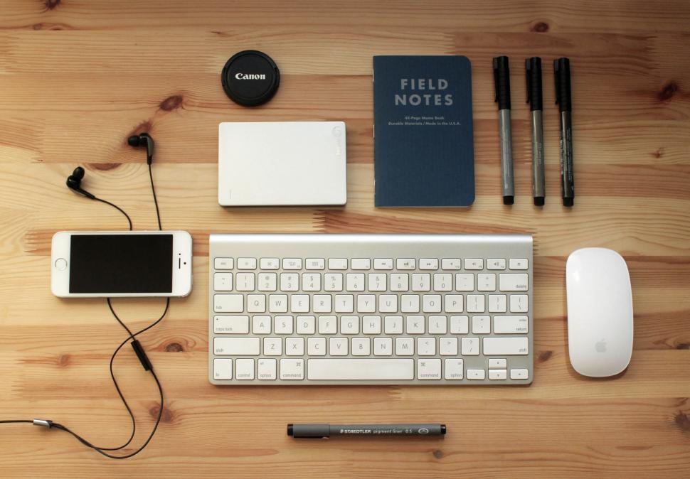 Free Image of Flat lay of tech gadgets and stationery 