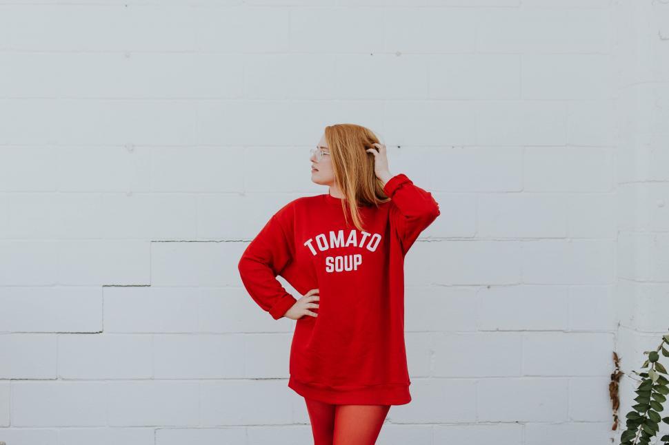 Free Image of Woman in red with Tomato Soup slogan 