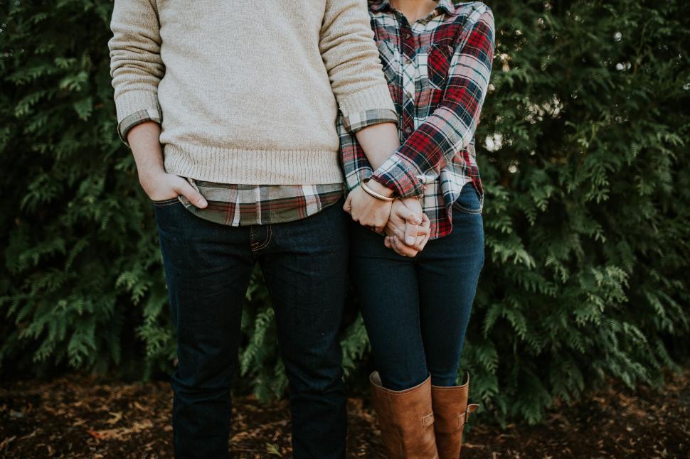 Free Image of Couple embracing in a natural setting 