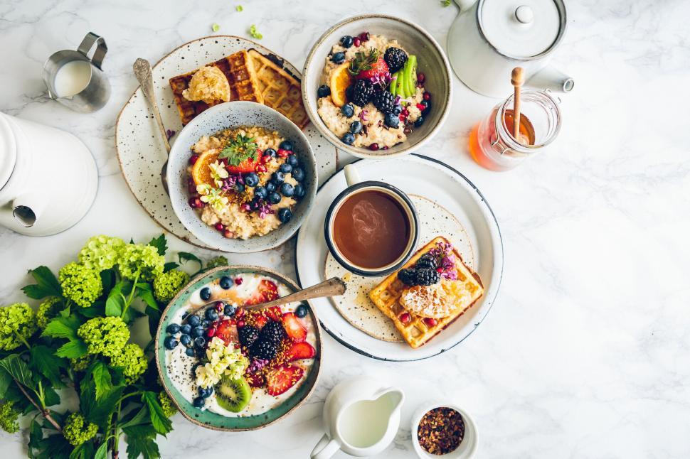 Free Image of Assorted breakfast dishes with tea and coffee 
