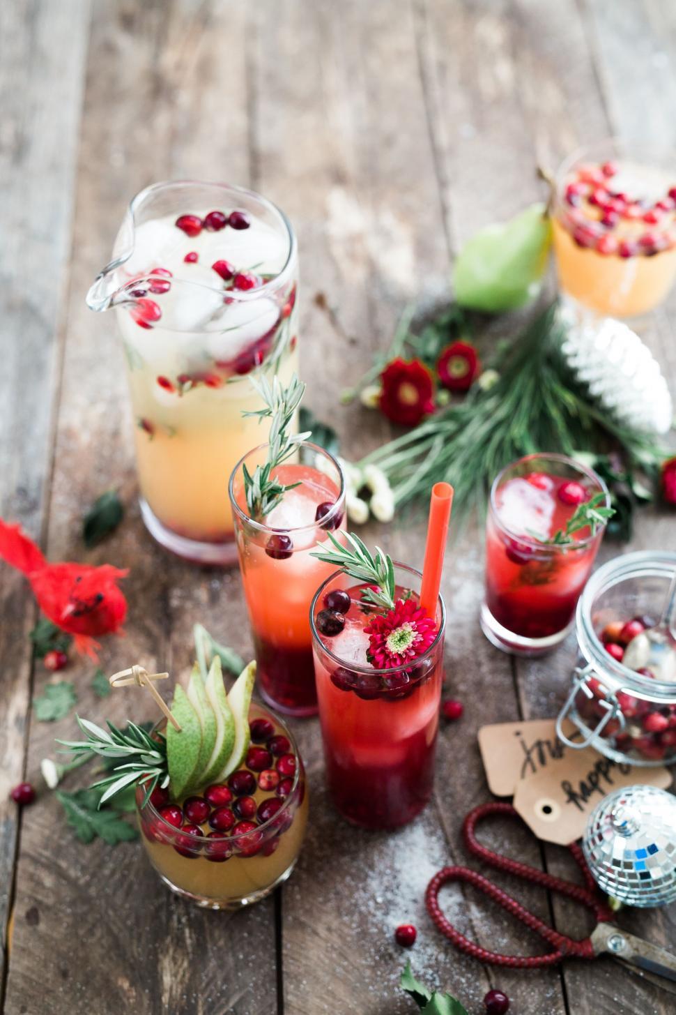 Free Image of Colorful fruit cocktails on a rustic table 