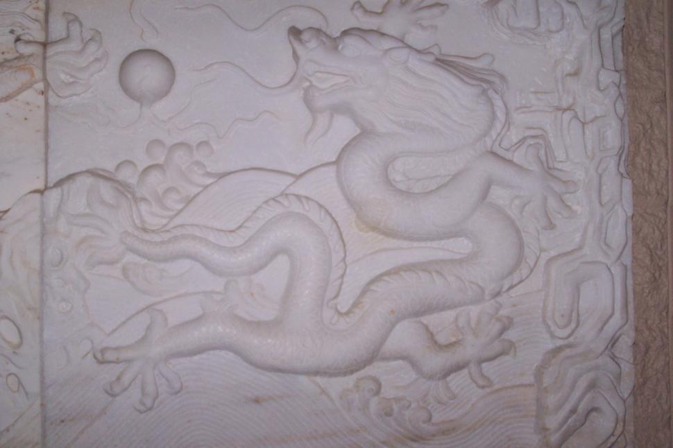 Free Image of Monster Wall Carving 