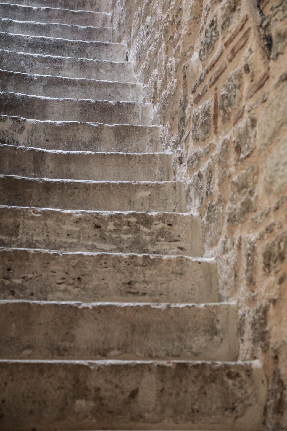 Free Image of Ancient weathered stone staircase close-up 