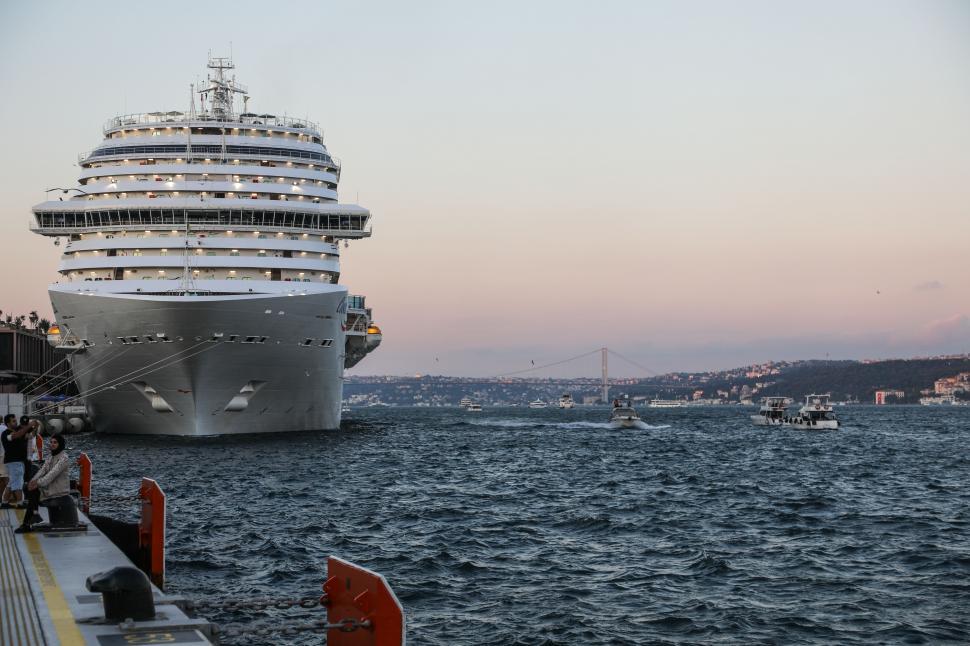 Free Image of Cruise ship docked in harbor at sunset 