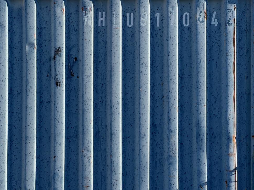 Free Image of Blue corrugated metal container wall 