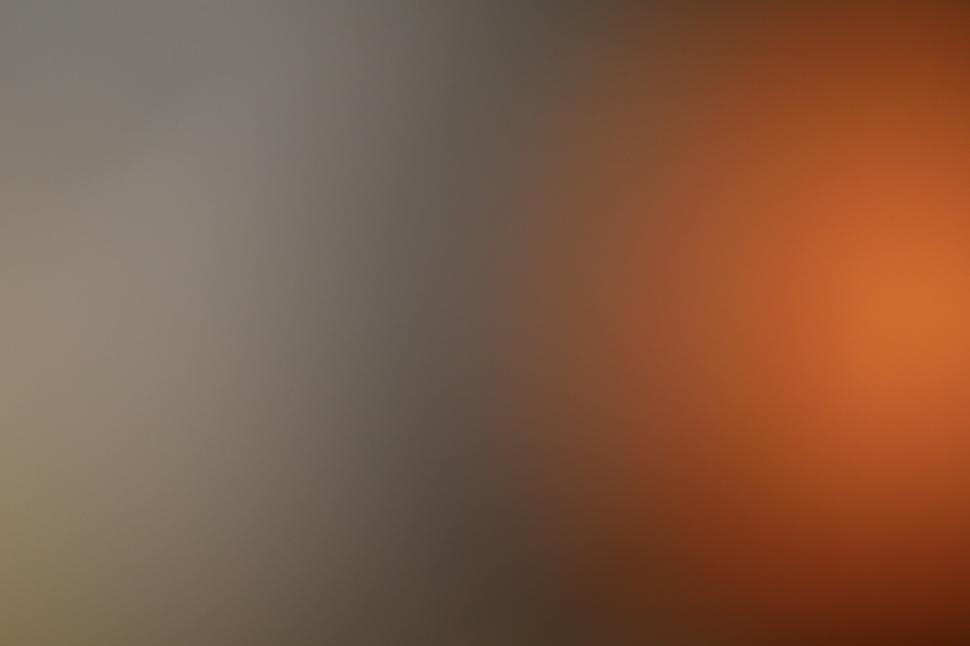 Free Image of Soft orange and grey gradient background 