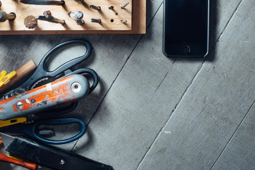 Free Image of Work tools and smartphone on wooden table 