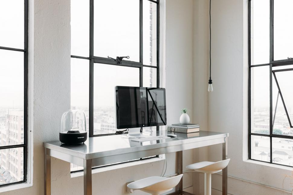 Free Image of Minimalist home office with cityscape view 