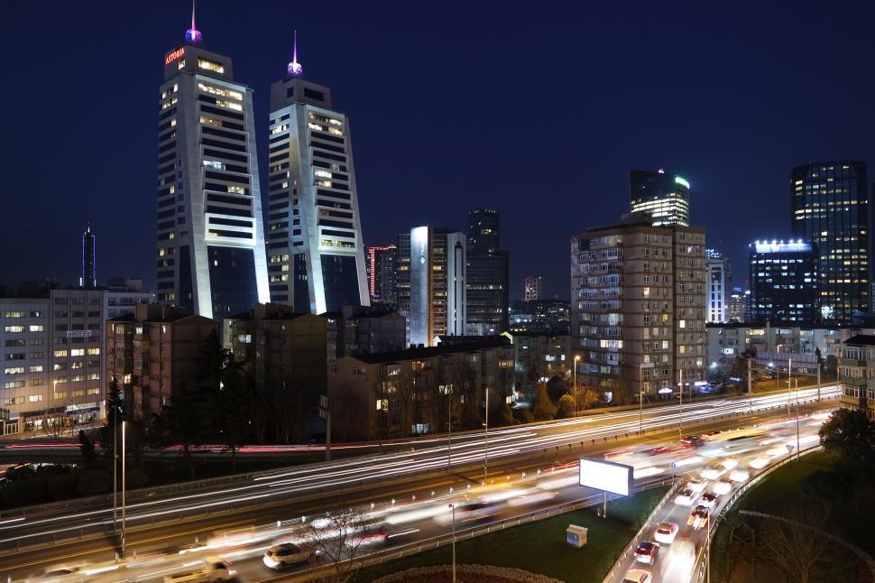 Free Image of Night view of illuminated city buildings 