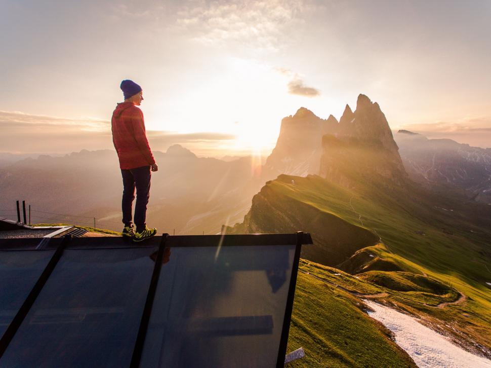 Free Image of Man on cliff during sunrise in mountains 