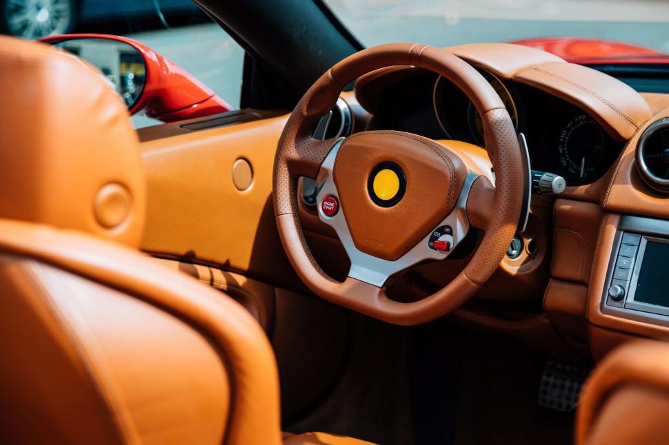 Free Image of Luxury car interior with focus on steering wheel 