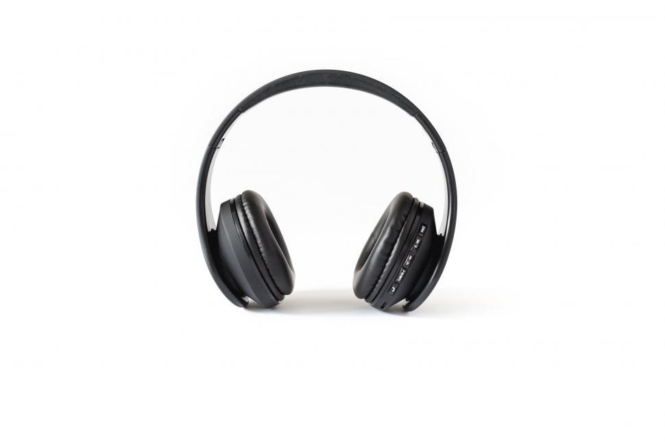 Free Image of Wireless black headphones against white background 