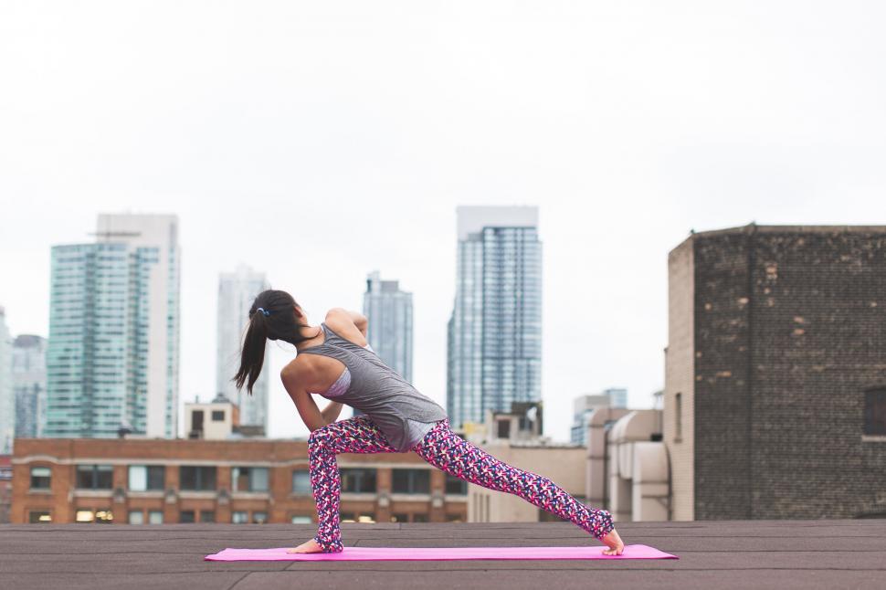 Free Image of Yoga practice on city rooftop during daytime 