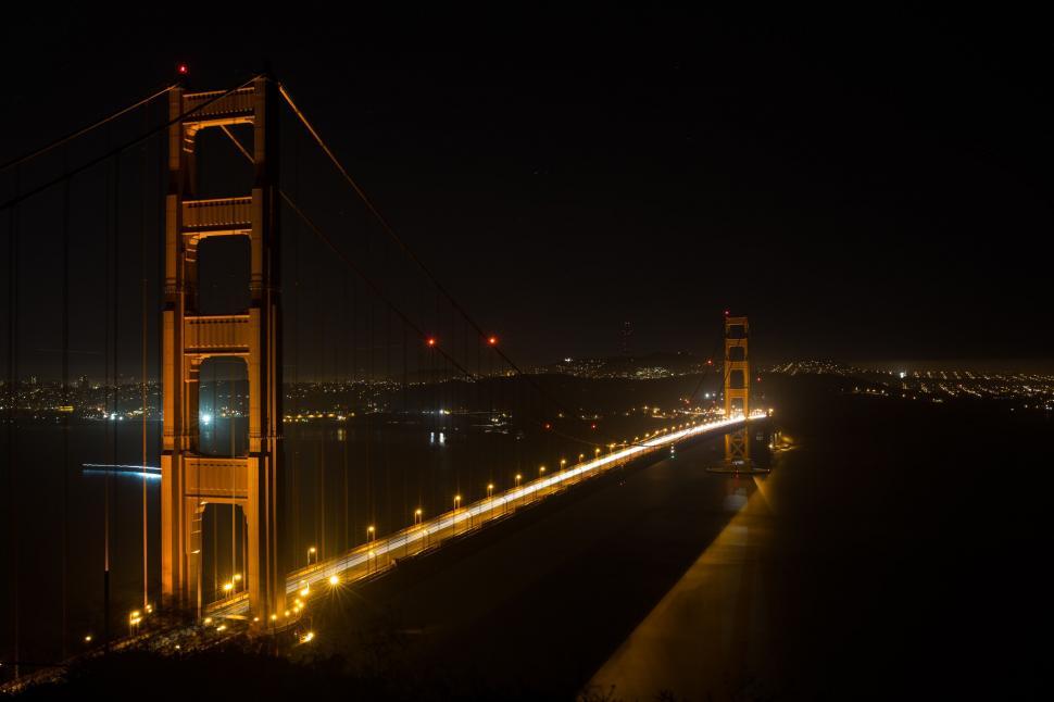 Free Image of Night view of the Golden Gate Bridge illuminated 