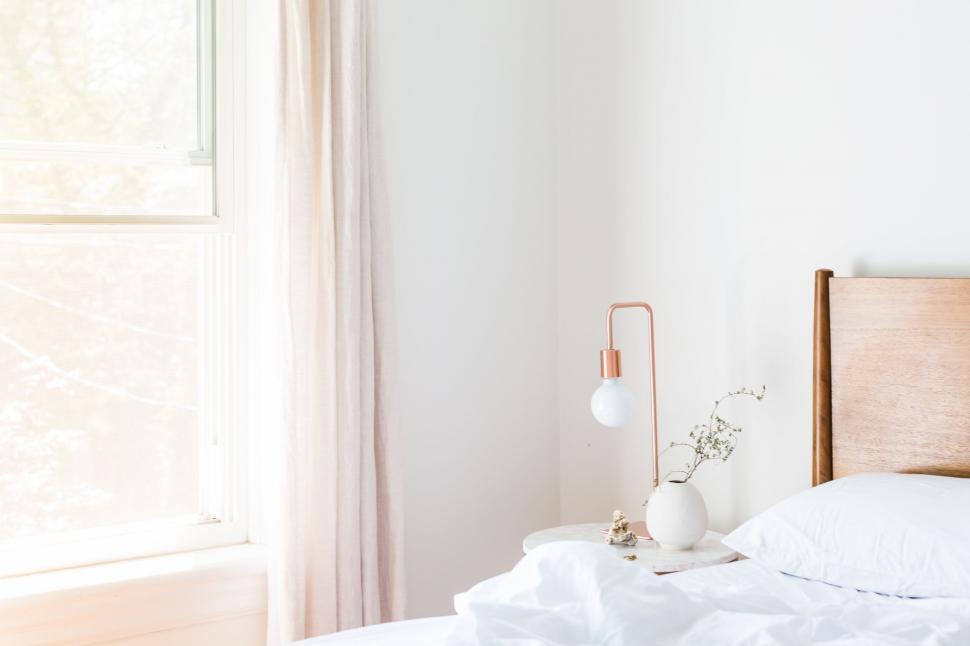 Free Image of Bright airy bedroom with simple decor 
