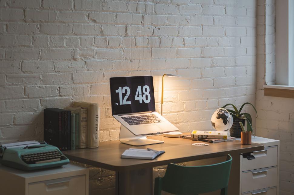 Free Image of Cozy workspace with vintage and modern elements 
