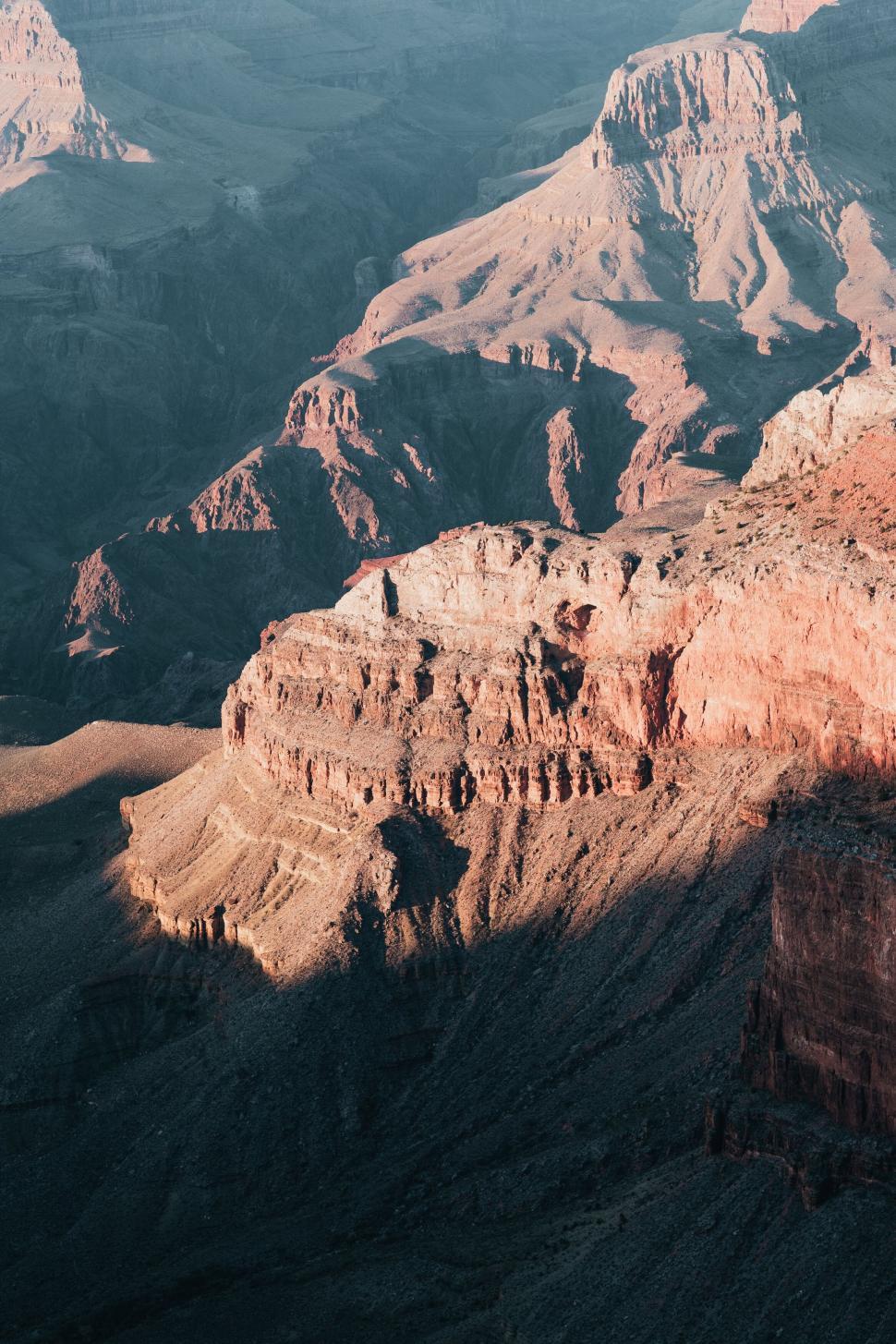 Free Image of Sunset light casting on Grand Canyon 