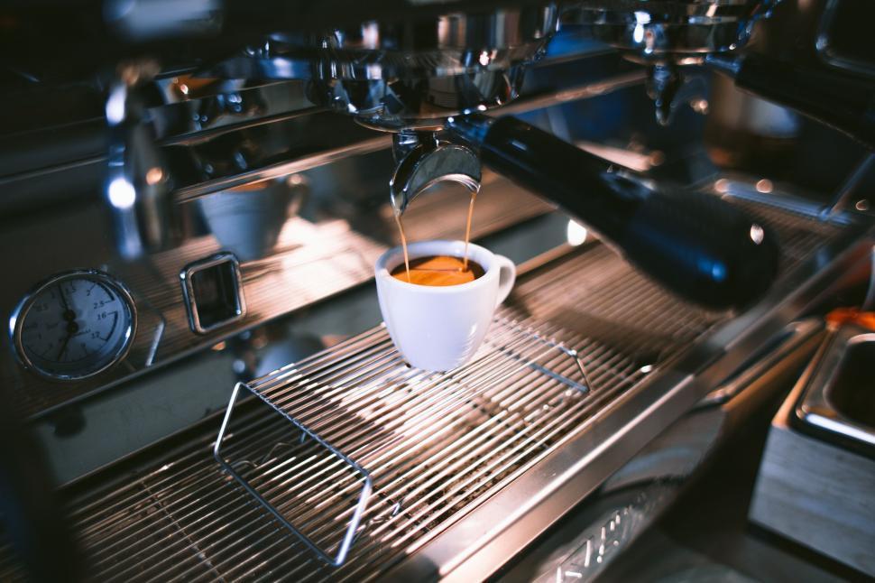 Free Image of Espresso shot being brewed in a machine 