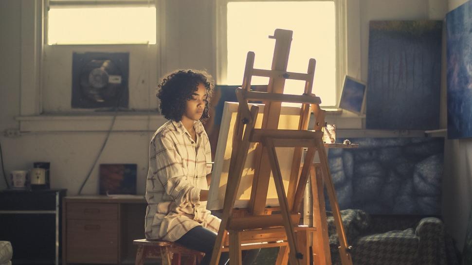 Free Image of Artist painting on canvas in studio 