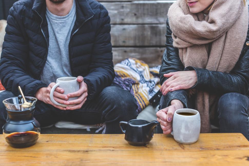 Free Image of Couple enjoying a winter coffee date 