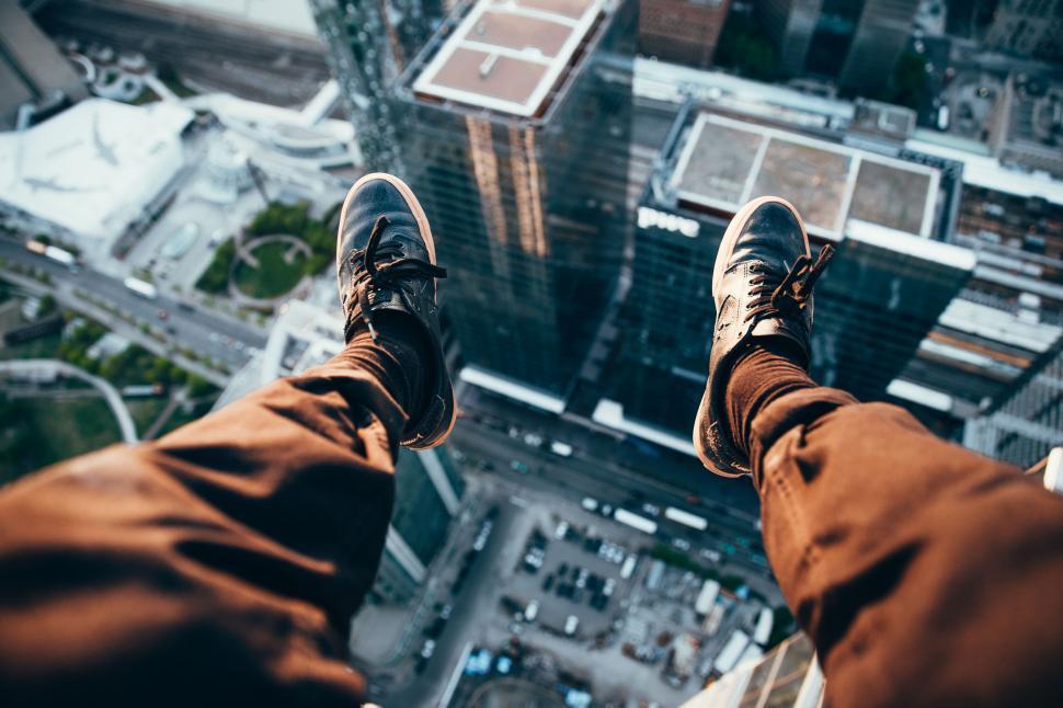 Free Image of Daring urban explorer above cityscape 