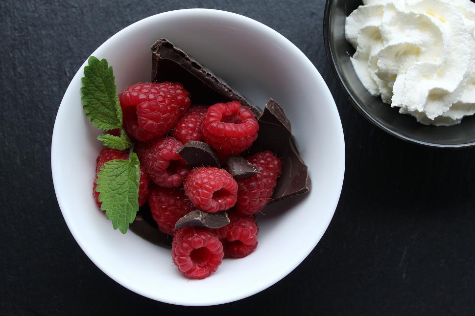 Free Image of Raspberries and chocolate on a white dish 