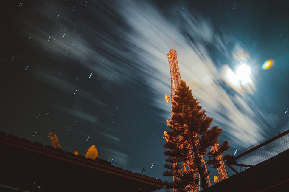 Free Image of Starry Night Sky with Silhouetted Tower 
