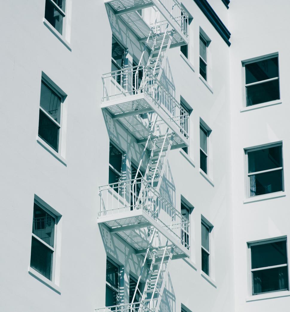 Free Image of Fire escape on a white modern building facade 