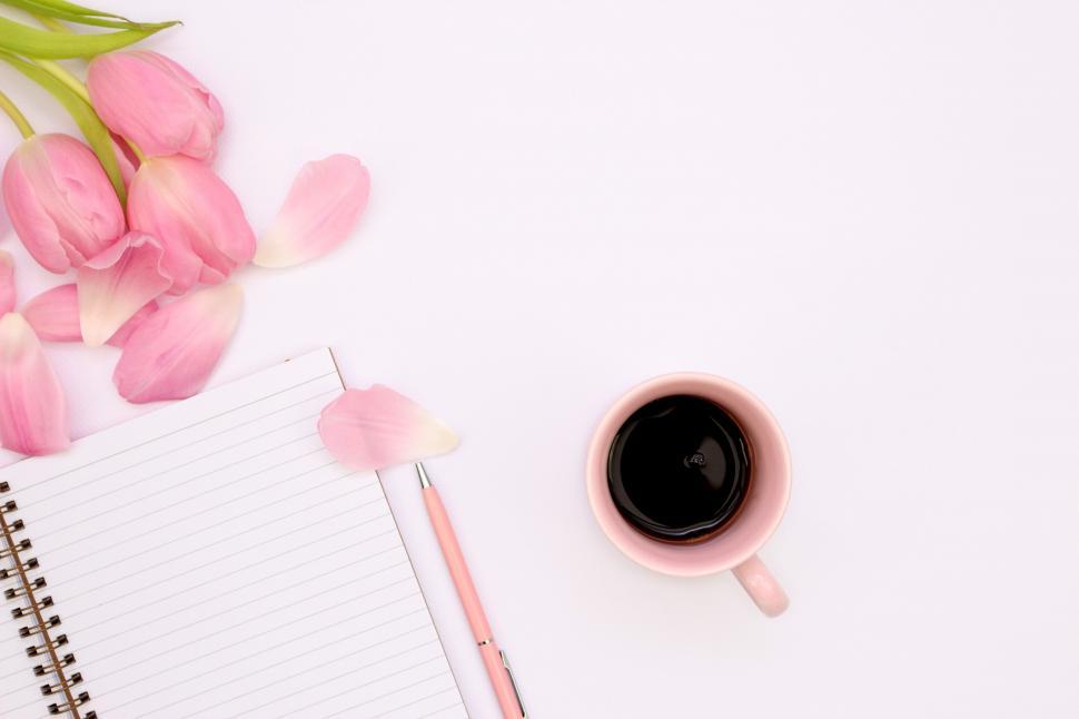 Free Image of Coffee cup and tulips with a notebook 