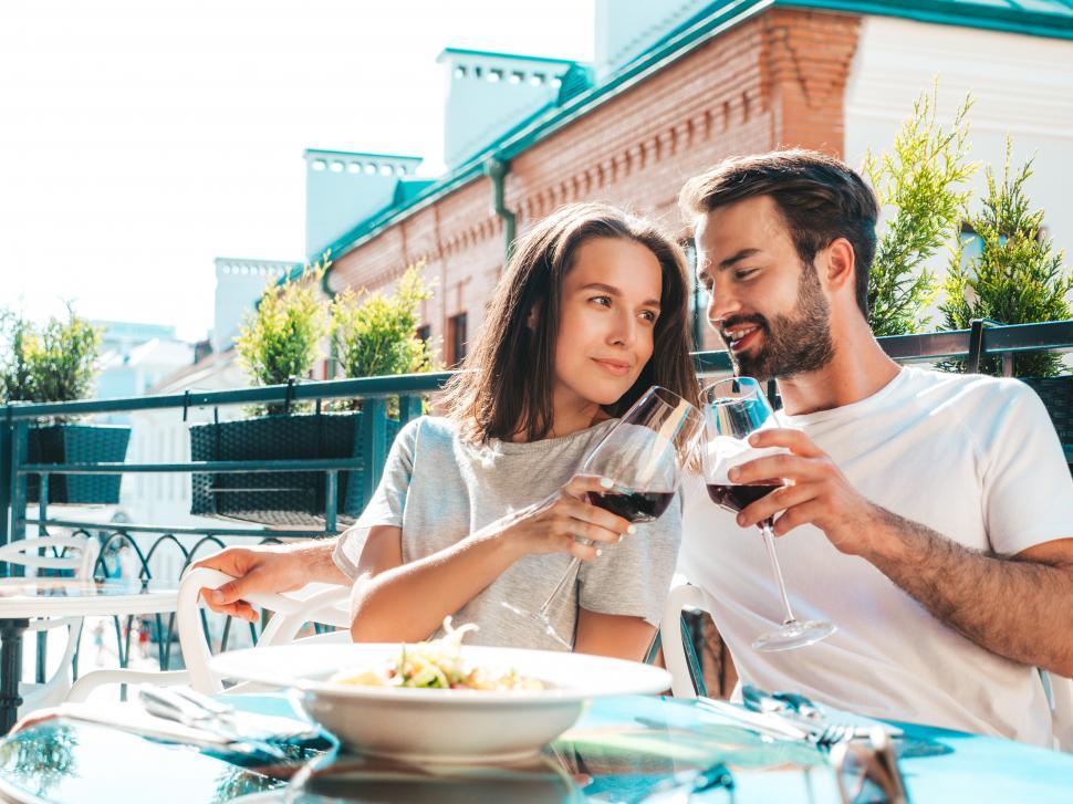 Free Image of A man and woman drinking wine 