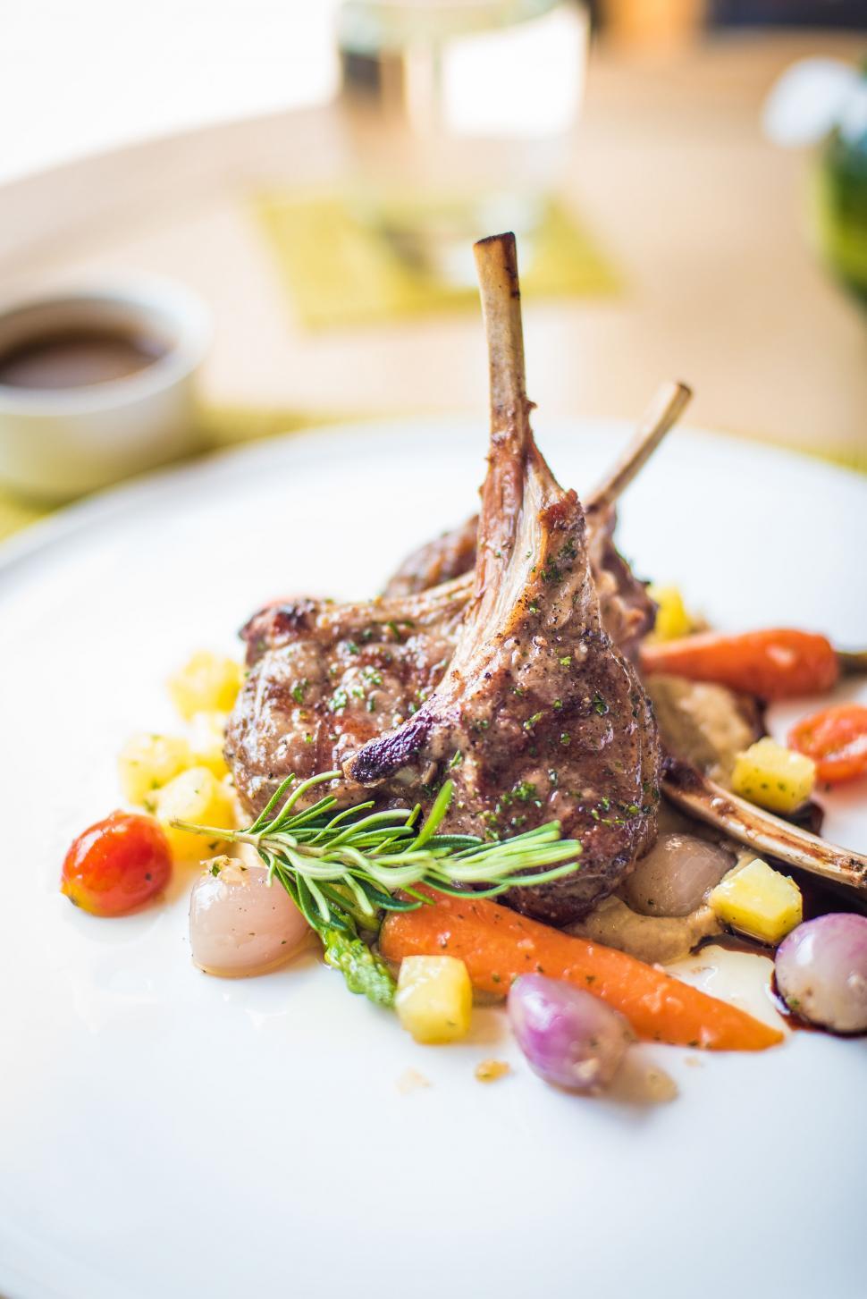 Free Image of Grilled lamb chops with vegetables on plate 