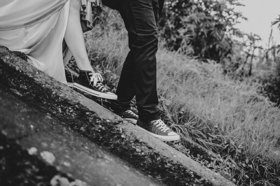 Free Image of Couple s feet in black and white photo 