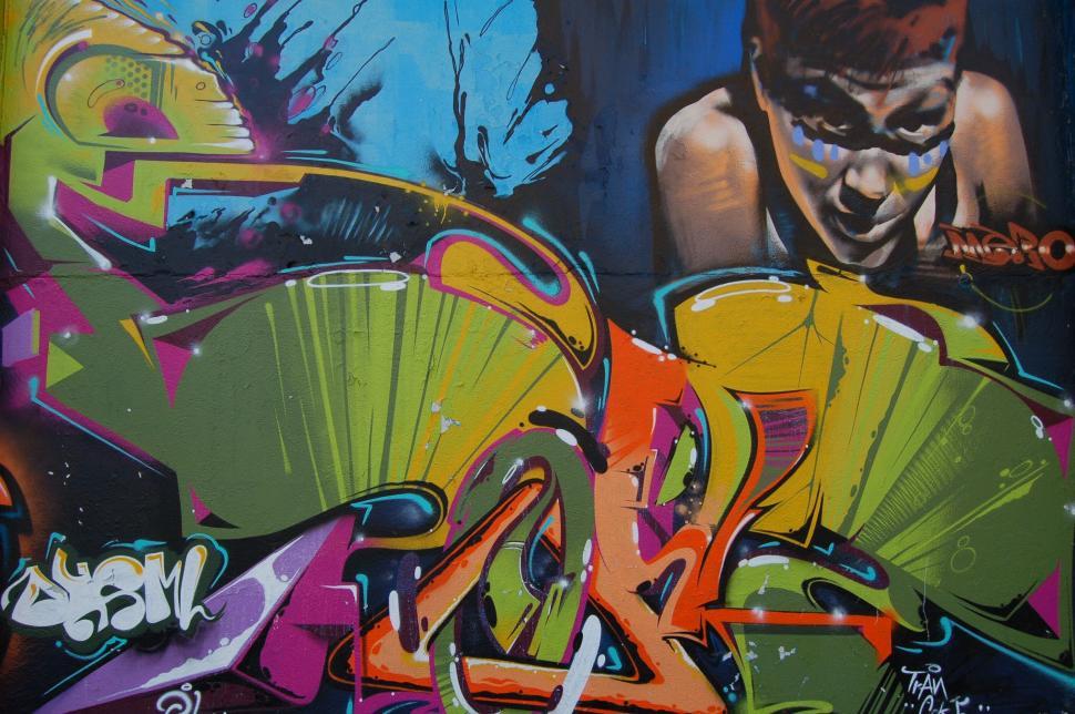 Free Image of Vibrant urban graffiti art on wall 