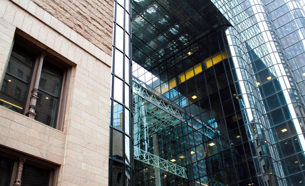 Free Image of Modern glass building facade with reflections 