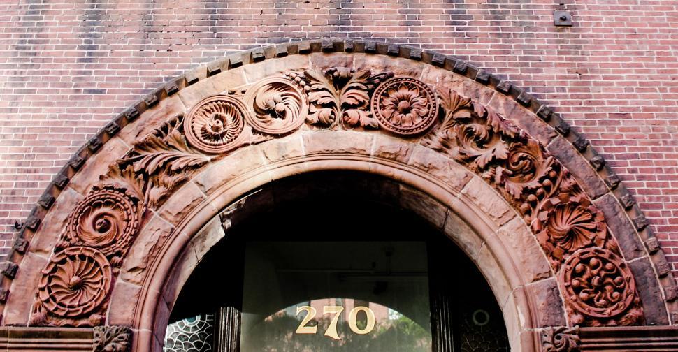 Free Image of Architectural detail of an ornate building entry 