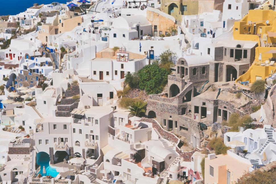 Free Image of Cliffside white houses in Santorini Greece 