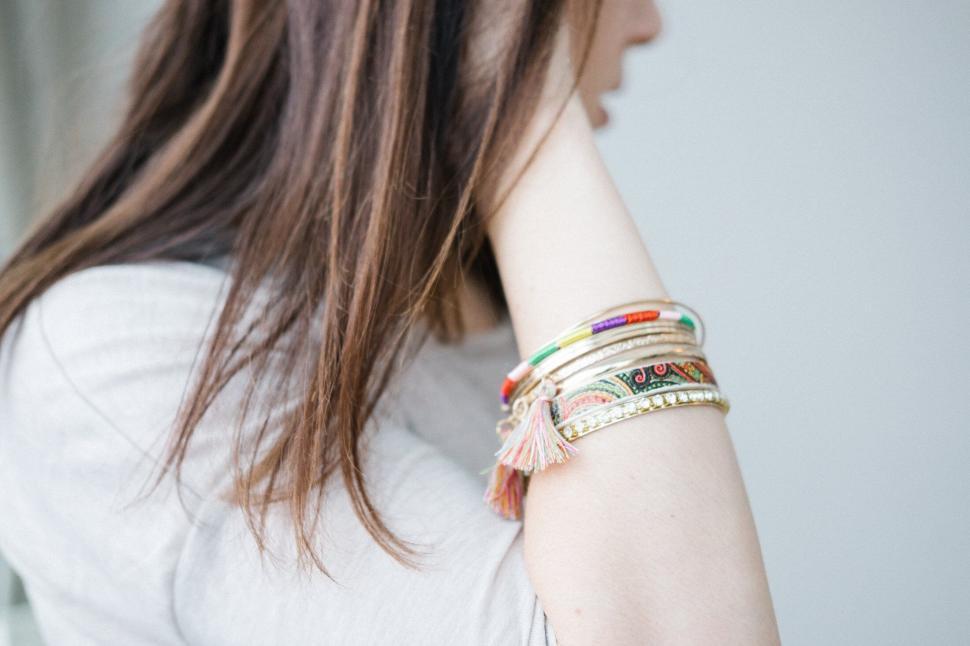 Free Image of Woman with colorful bracelets soft focus 