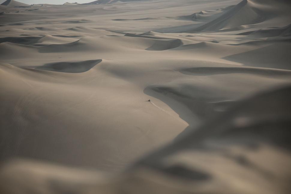 Free Image of Majestic sand dunes under a warm light 