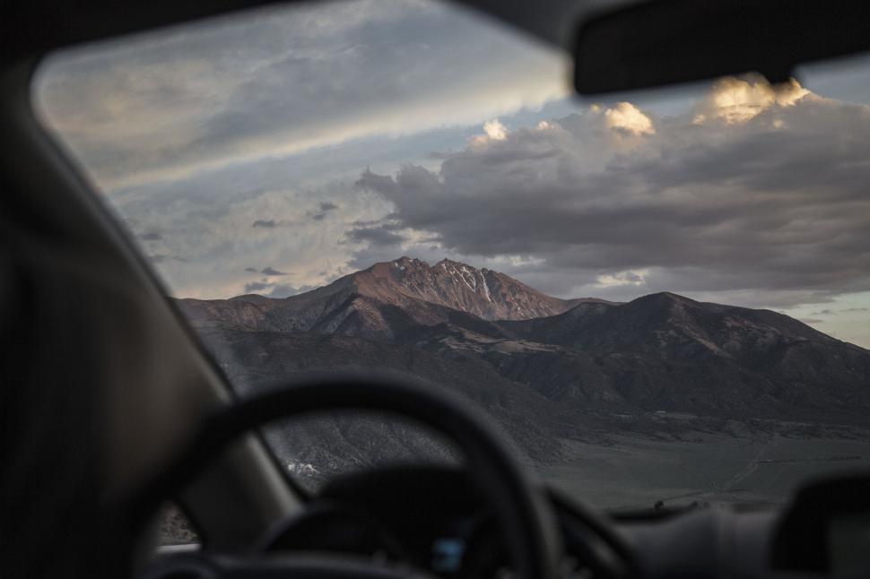 Free Image of Mountain view from a car s perspective 